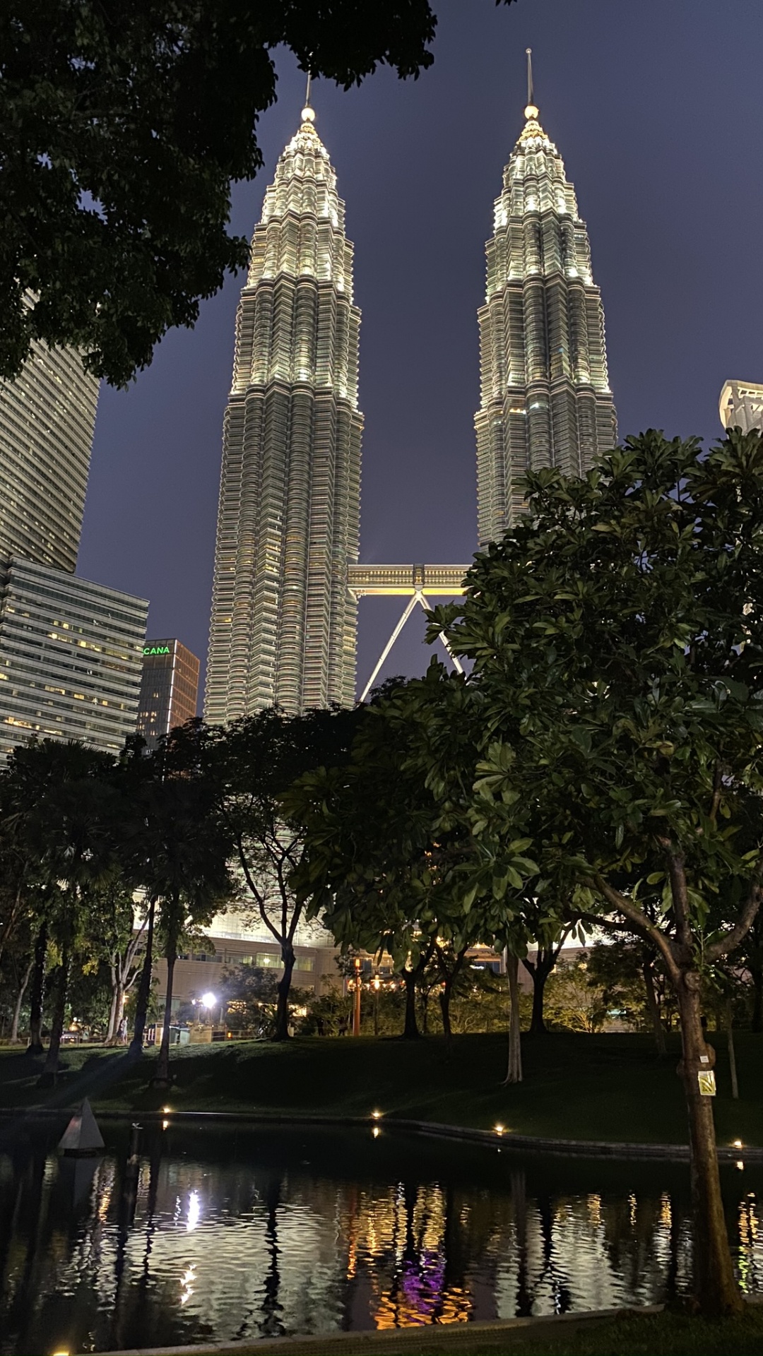 Petronas Towers, Kuala Lumpur, Malaysia, Reflection, Body of Water. Wallpaper in 1080x1920 Resolution