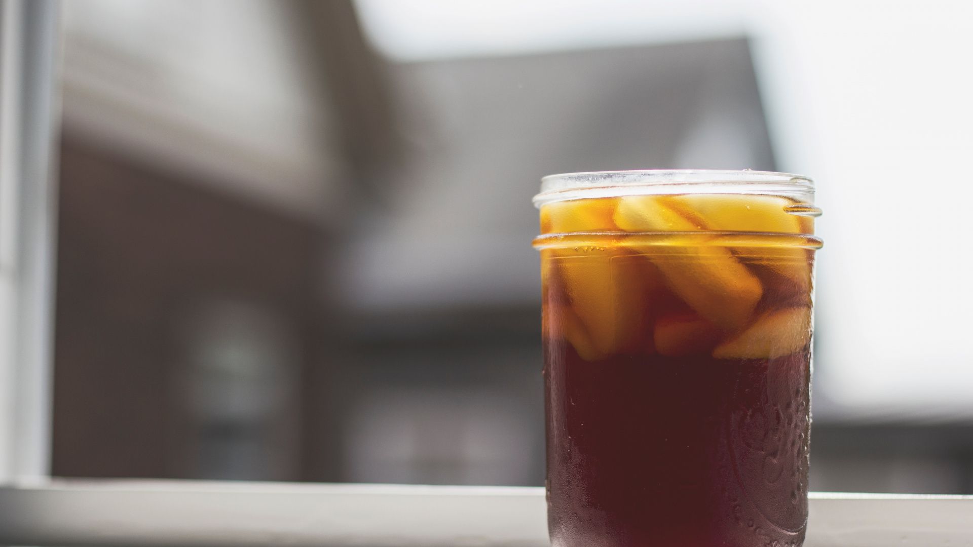 Clear Glass Jar With Brown Liquid Inside. Wallpaper in 1920x1080 Resolution