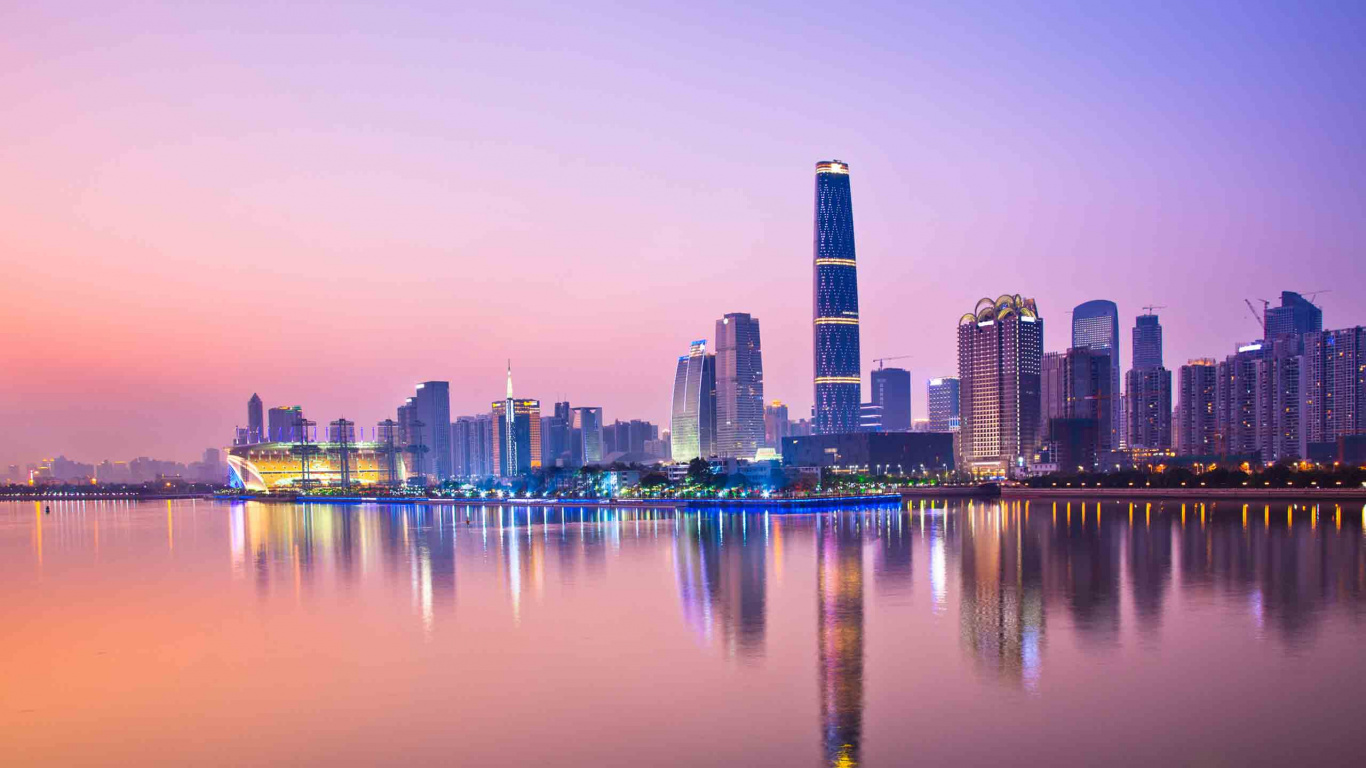 City Skyline Across Body of Water During Night Time. Wallpaper in 1366x768 Resolution