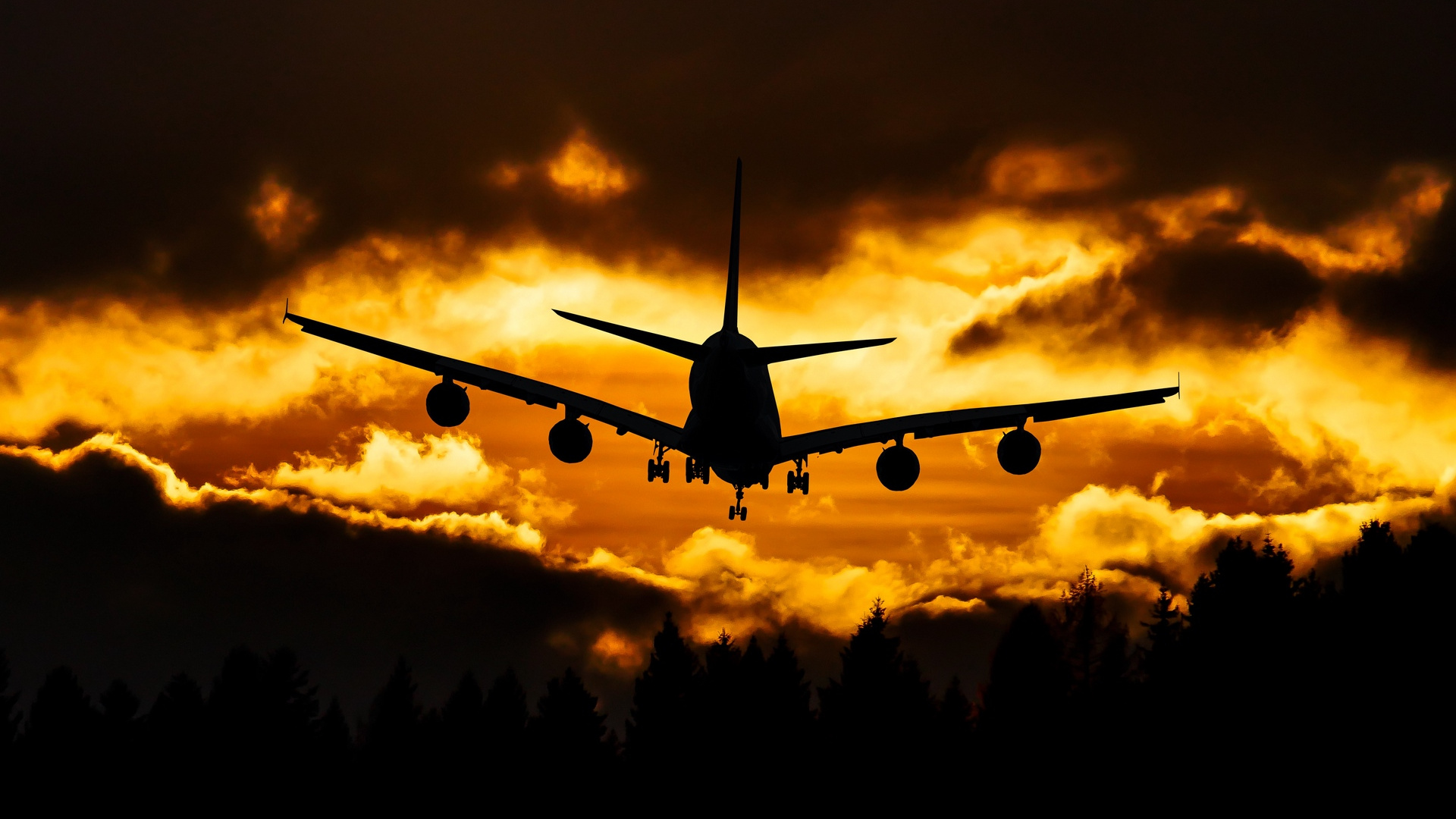 Avión Volando Sobre Las Nubes Durante la Puesta de Sol. Wallpaper in 1920x1080 Resolution