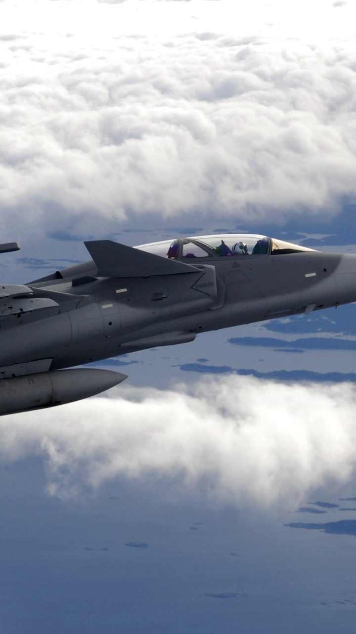 Gray Fighter Jet Flying Over White Clouds During Daytime. Wallpaper in 720x1280 Resolution