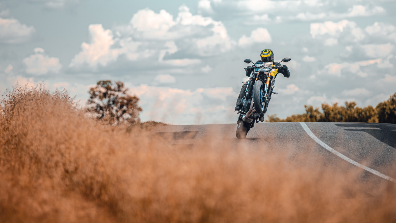 Man in Black Jacket Riding Motorcycle on Road During Daytime. Wallpaper in 1366x768 Resolution