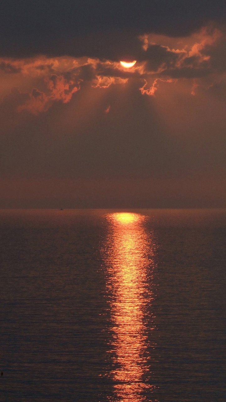 Body of Water Under Cloudy Sky During Sunset. Wallpaper in 720x1280 Resolution