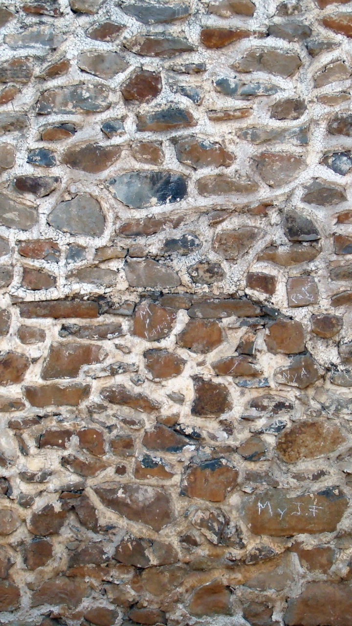Braune Und Weiße Mauer. Wallpaper in 720x1280 Resolution