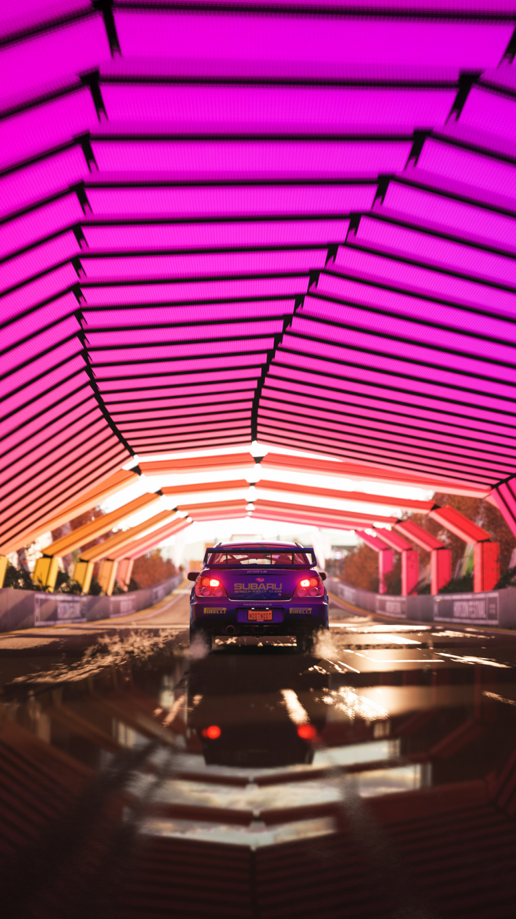 Voiture Rouge et Noire Dans le Tunnel. Wallpaper in 750x1334 Resolution