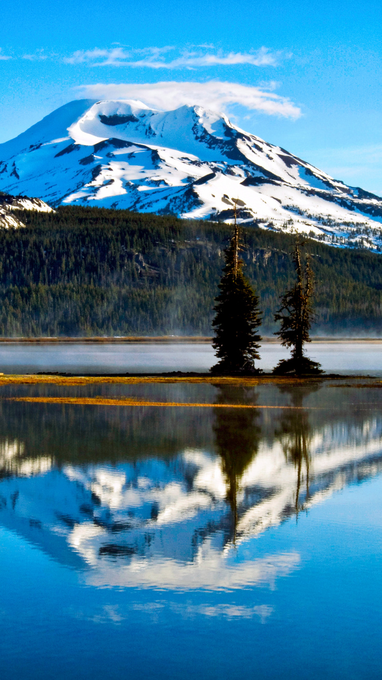 Snow Covered Mountain Near Lake During Daytime. Wallpaper in 750x1334 Resolution