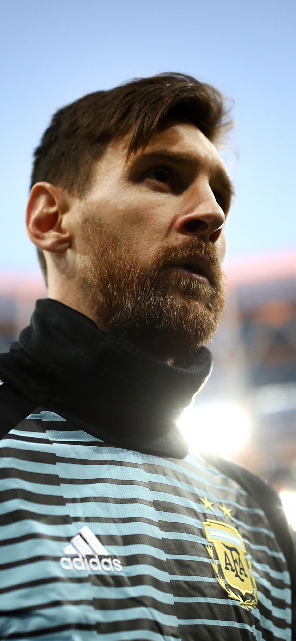 Man in Black and White Adidas Crew Neck Shirt. Wallpaper in 1242x2688 Resolution