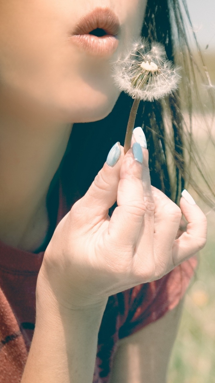 Woman in Red Shirt Holding Her Hair. Wallpaper in 720x1280 Resolution
