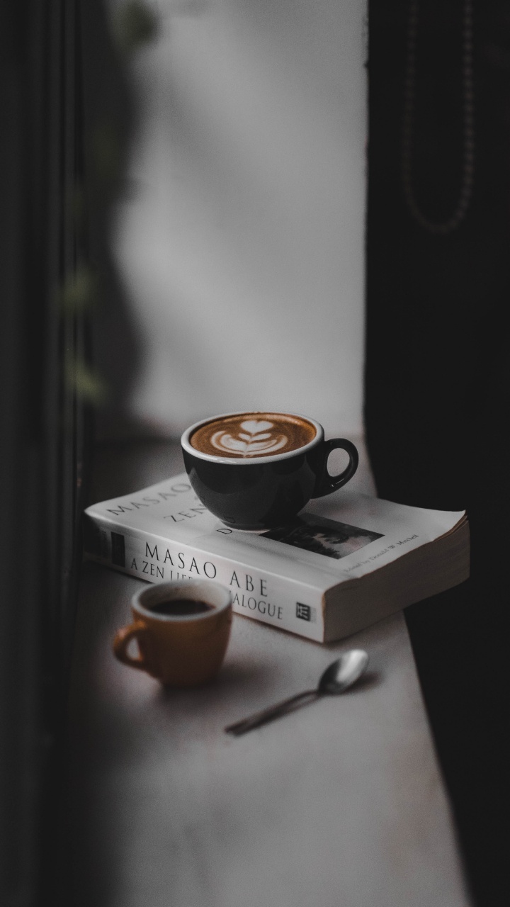 Black Ceramic Cup on White Wooden Table. Wallpaper in 720x1280 Resolution