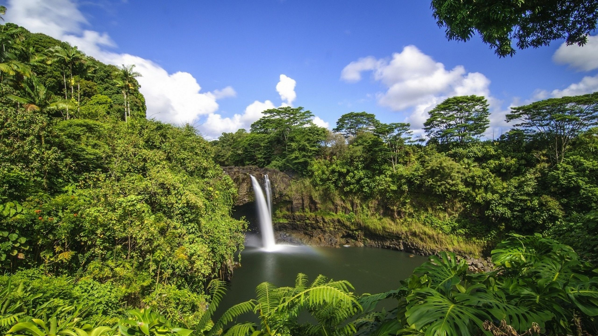 Waterfalls in The Middle of Green Trees Under Blue Sky and White Clouds During Daytime. Wallpaper in 1920x1080 Resolution