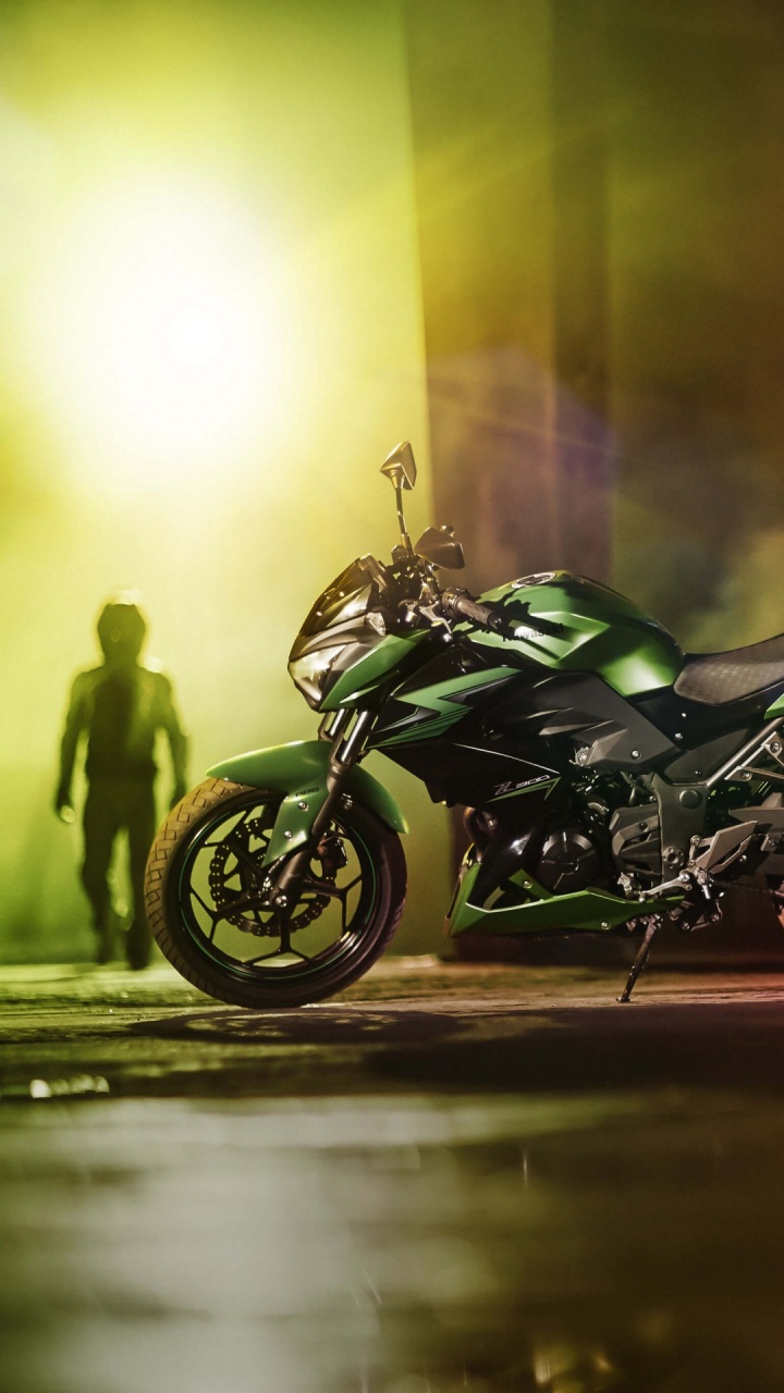 Black and Green Sports Bike. Wallpaper in 720x1280 Resolution