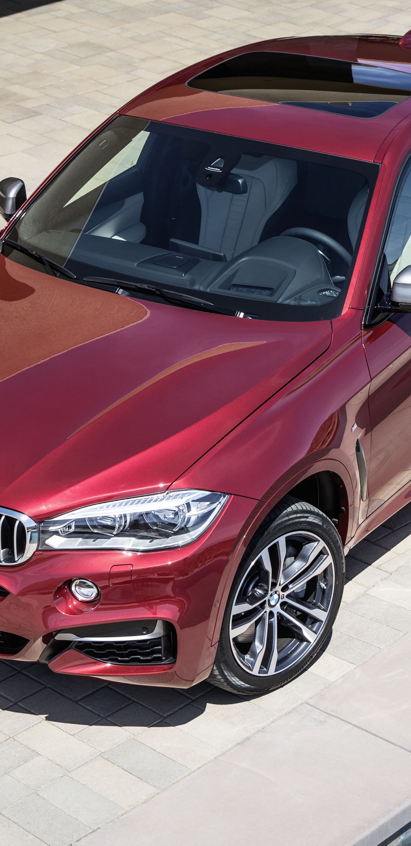 Red Bmw m 3 Coupe Parked on Gray Concrete Pavement During Daytime. Wallpaper in 1440x2960 Resolution