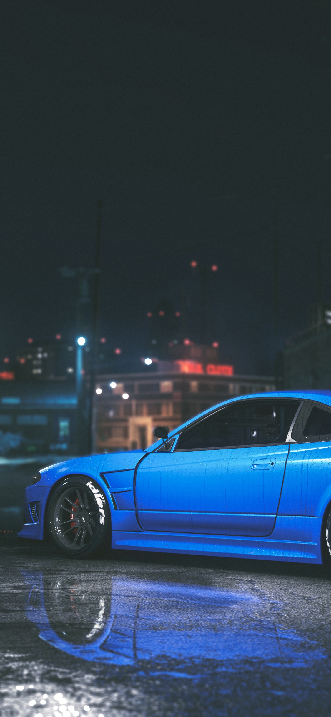 Coupe Azul en la Carretera Durante la Noche. Wallpaper in 1125x2436 Resolution