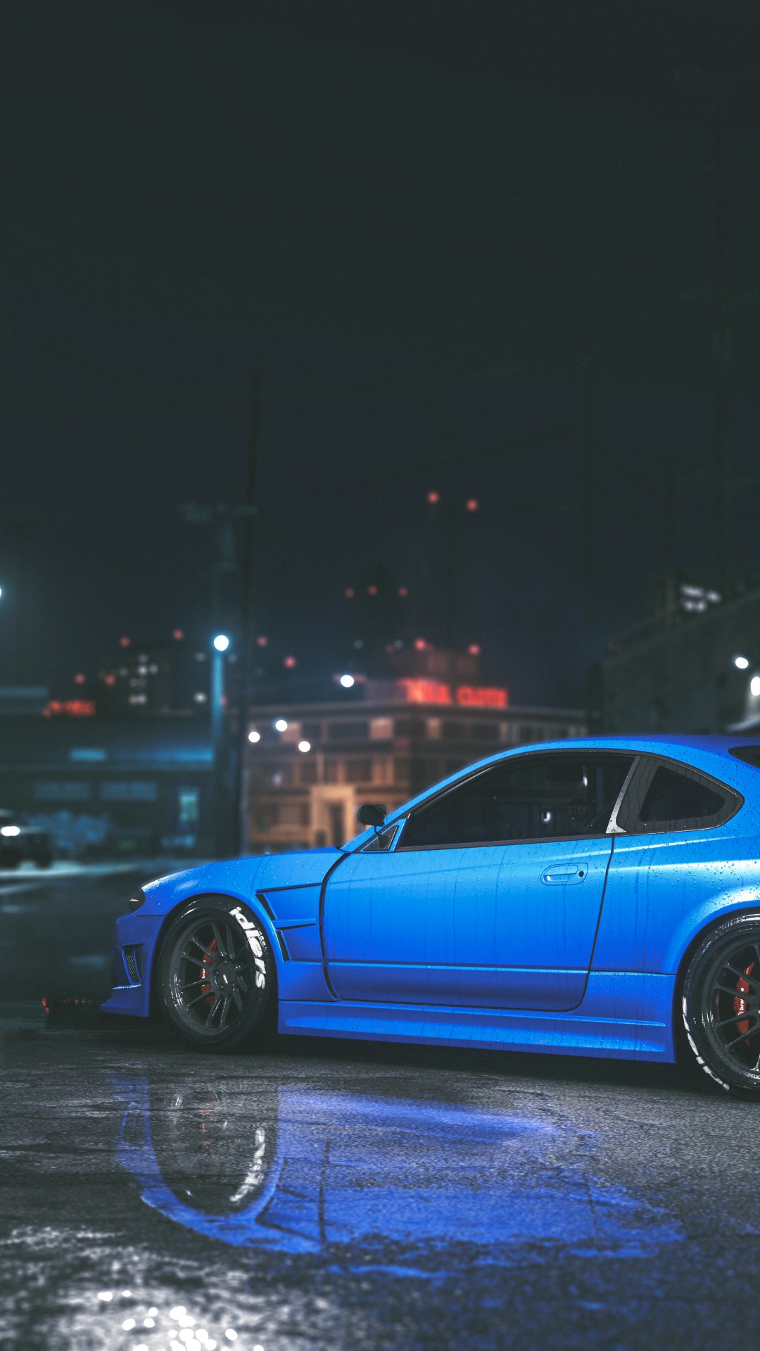 Blaues Coupe Unterwegs Während Der Nacht. Wallpaper in 1080x1920 Resolution