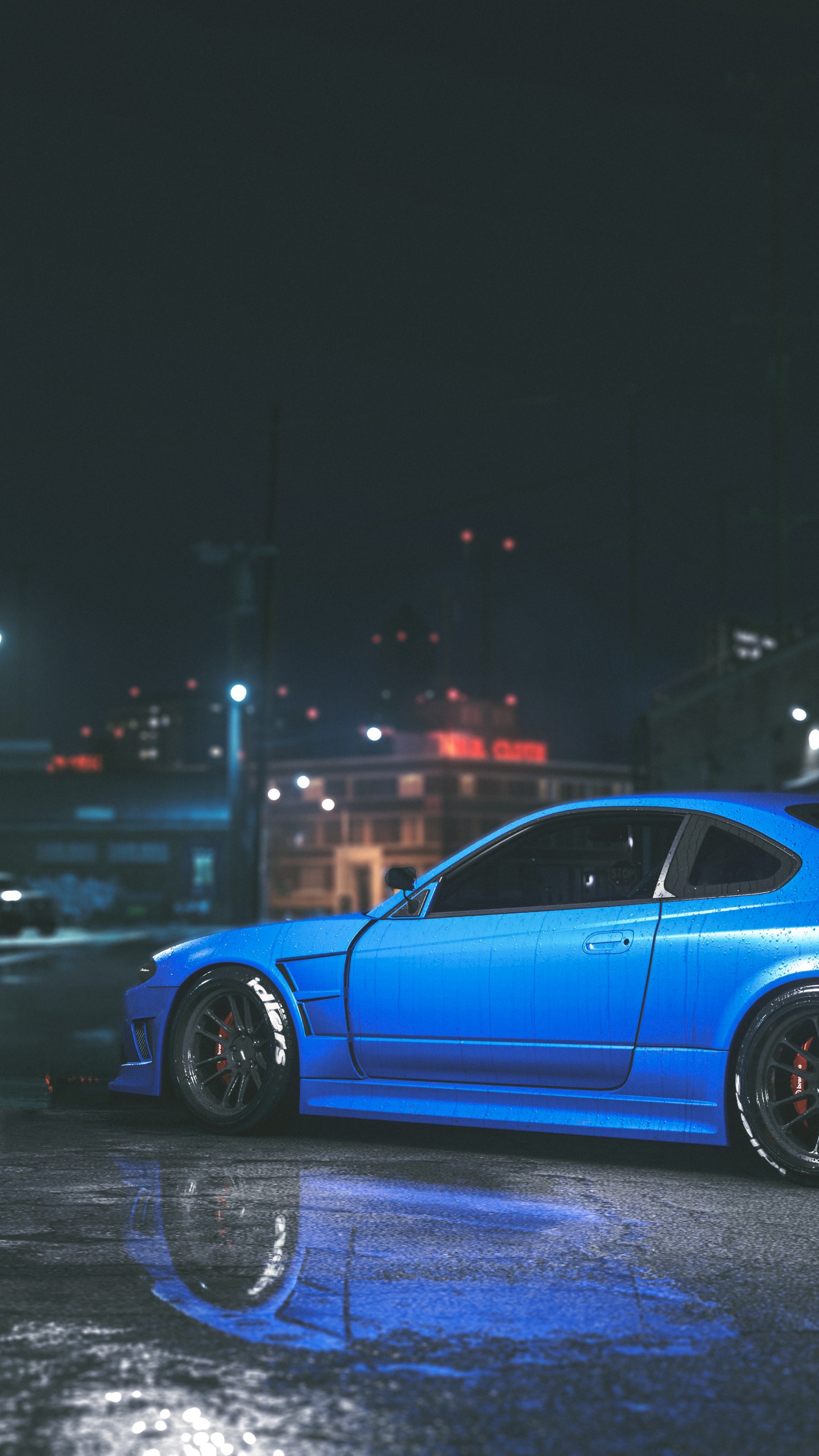 Blaues Coupe Unterwegs Während Der Nacht. Wallpaper in 1440x2560 Resolution