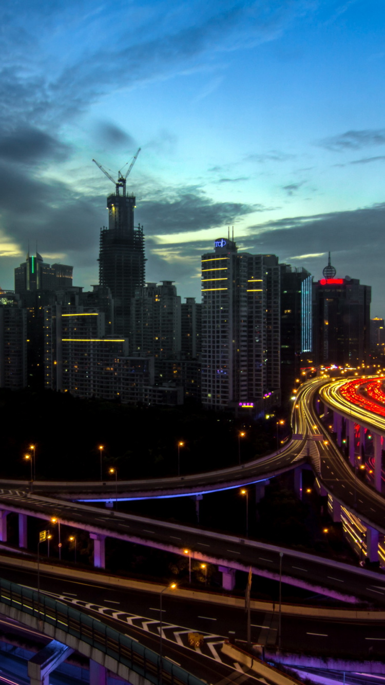 Time Lapse Photography of City During Night Time. Wallpaper in 750x1334 Resolution