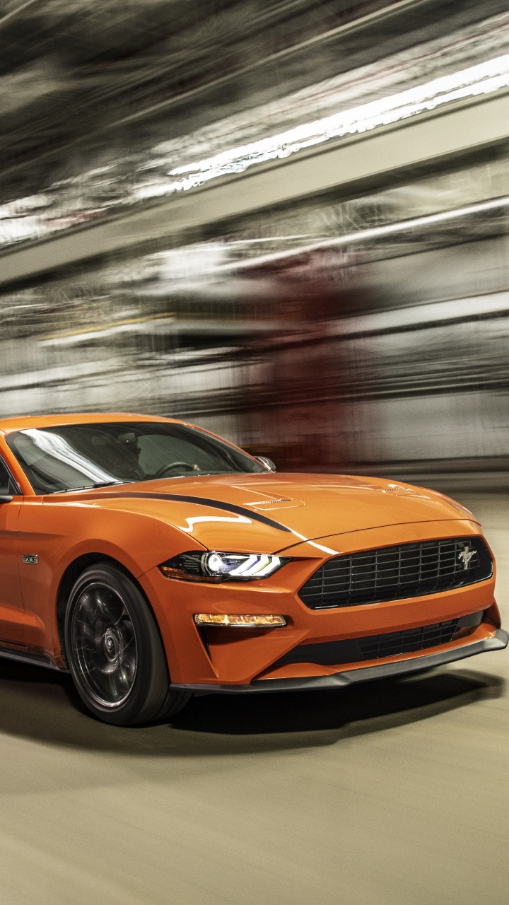 Orange Bmw m 3 Unterwegs. Wallpaper in 720x1280 Resolution