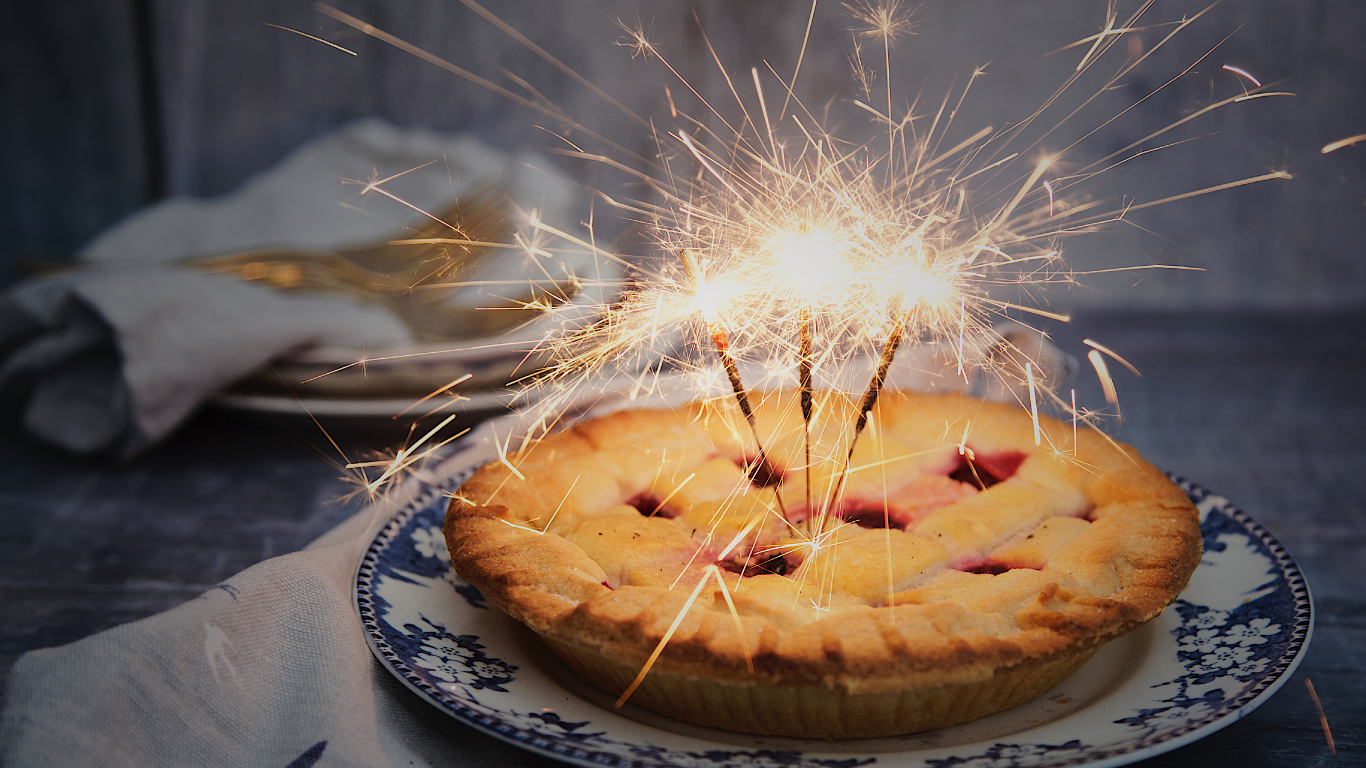 Brown Round Pastry on White and Blue Floral Ceramic Plate. Wallpaper in 1366x768 Resolution
