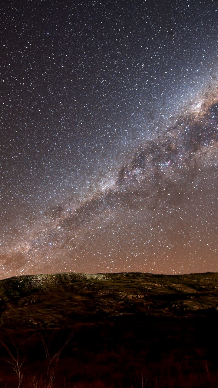 Starry Night Over The Mountain. Wallpaper in 720x1280 Resolution