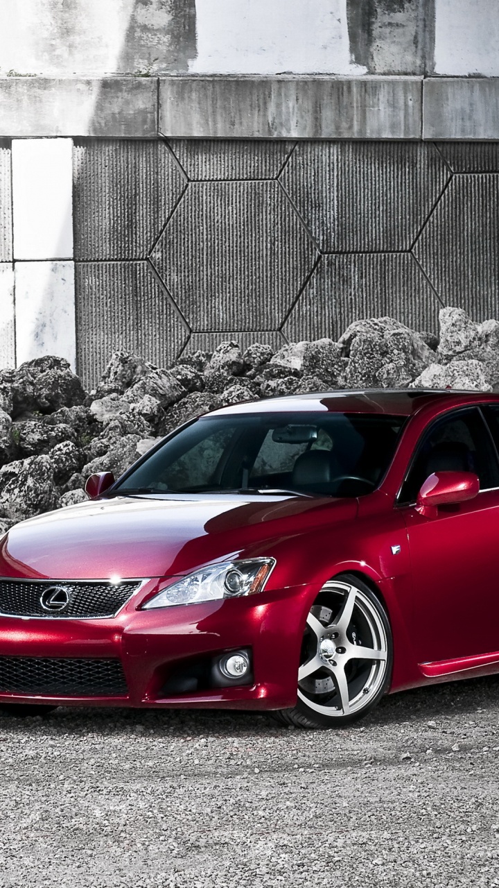 Roter Ferrari 458 Italia Neben Betonmauer Geparkt. Wallpaper in 720x1280 Resolution