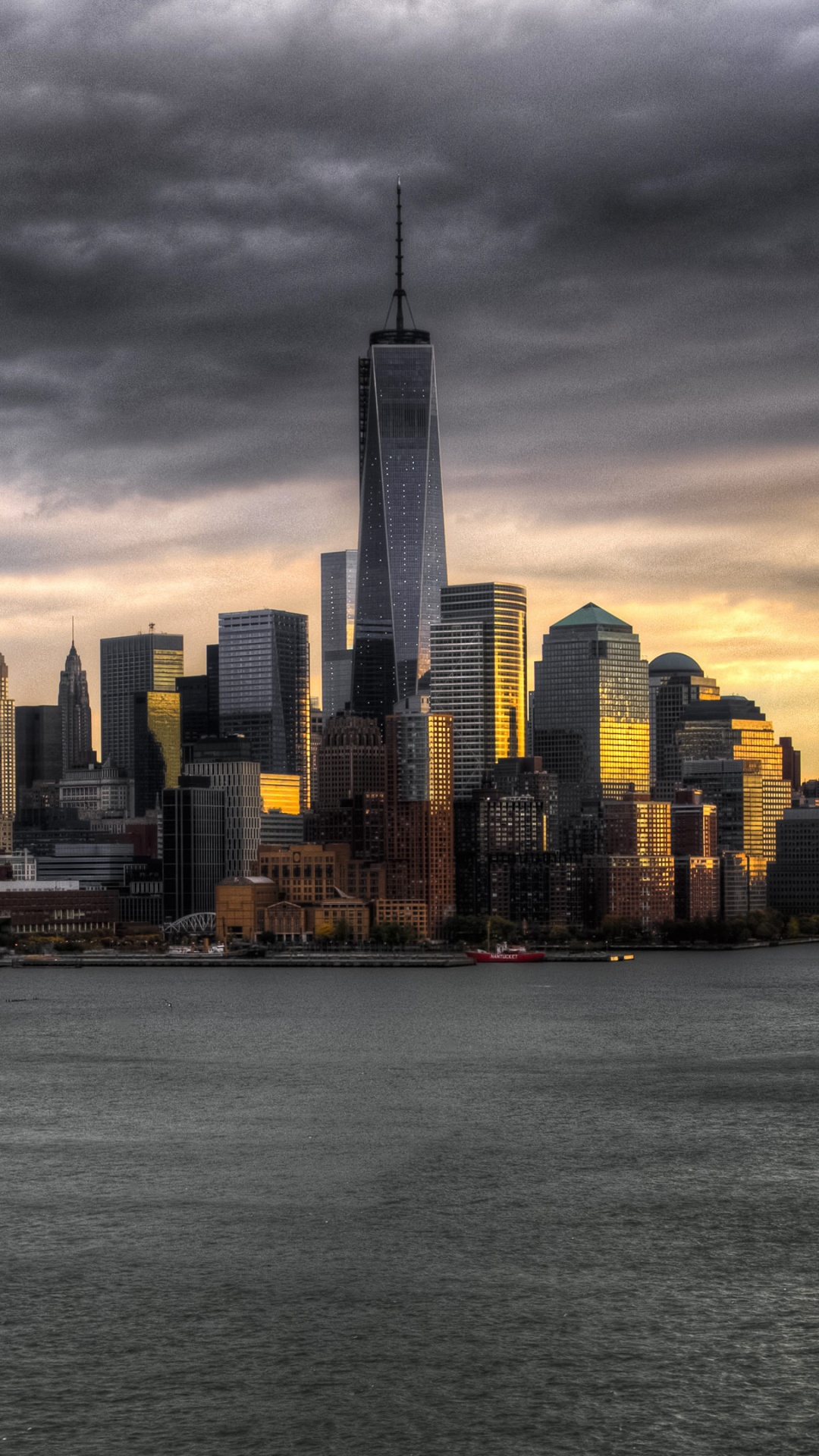 City Skyline Across Body of Water During Daytime. Wallpaper in 1080x1920 Resolution
