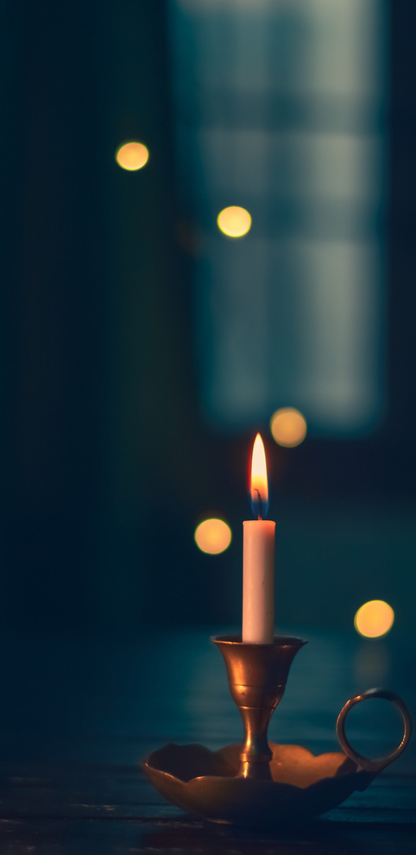 Lighted Candle in Black Holder. Wallpaper in 1440x2960 Resolution