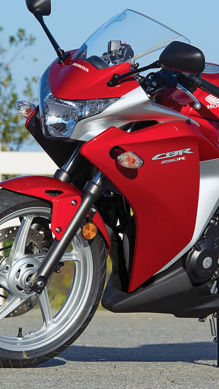 Red and Black Sports Bike on Road During Daytime. Wallpaper in 720x1280 Resolution