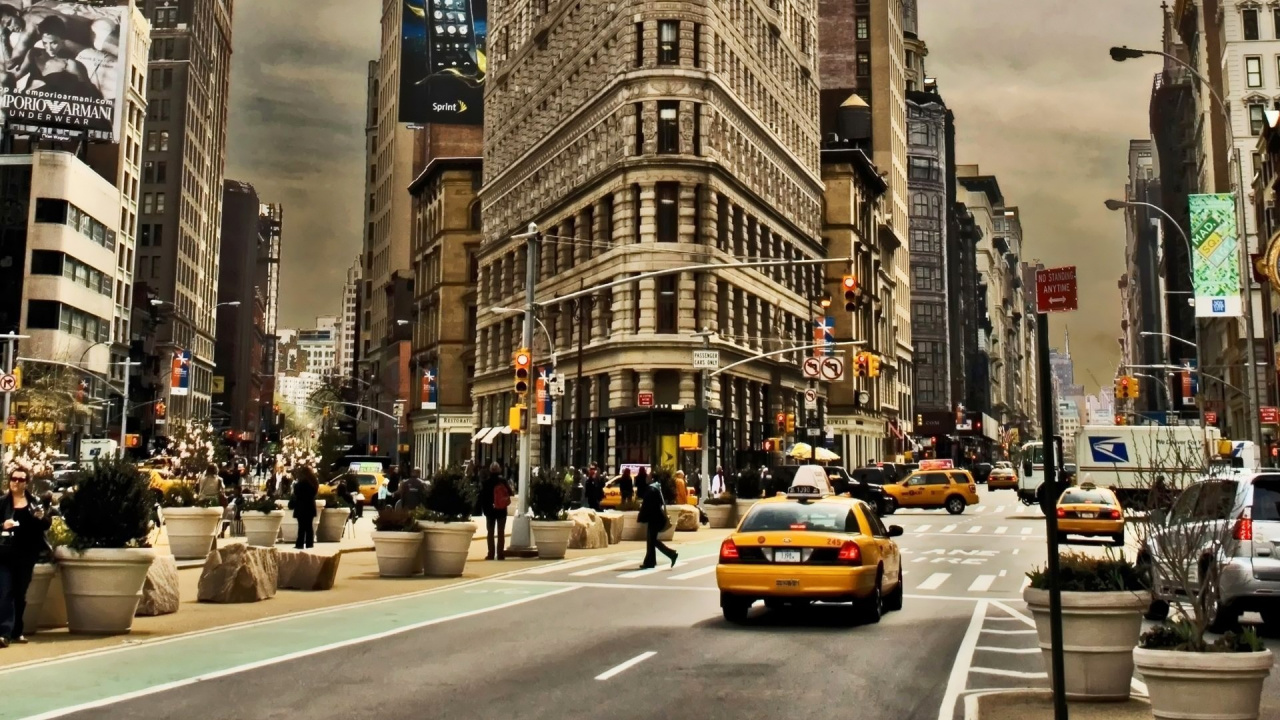 People Walking on Pedestrian Lane in Front of Brown Concrete Building During Daytime. Wallpaper in 1280x720 Resolution