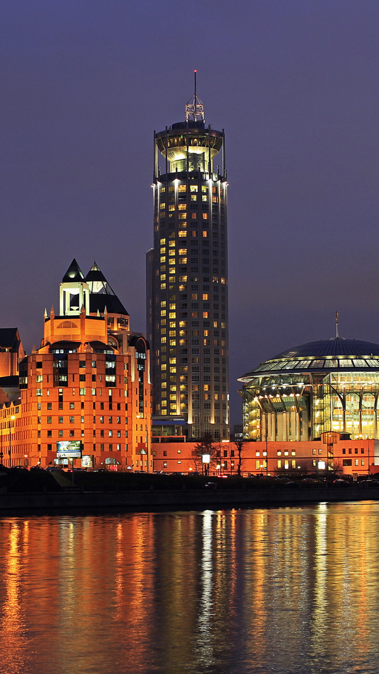 City Skyline During Night Time. Wallpaper in 750x1334 Resolution