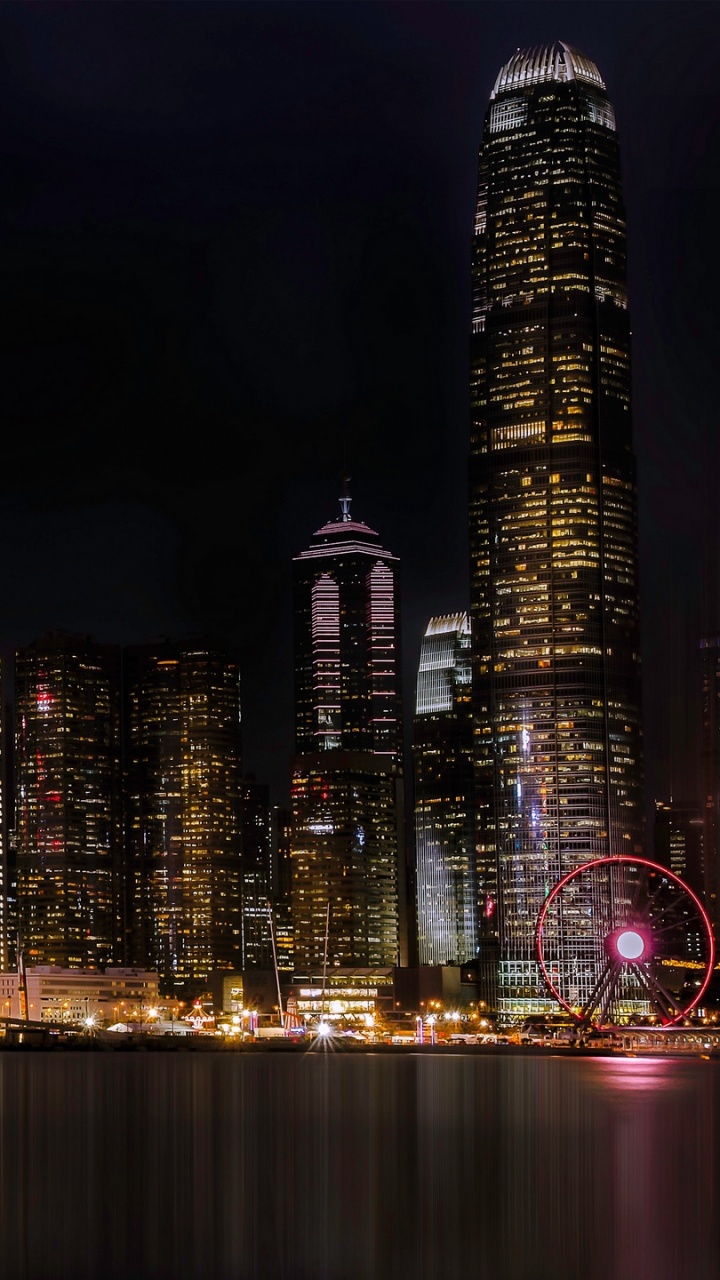 Horizonte de la Ciudad Durante la Noche. Wallpaper in 720x1280 Resolution