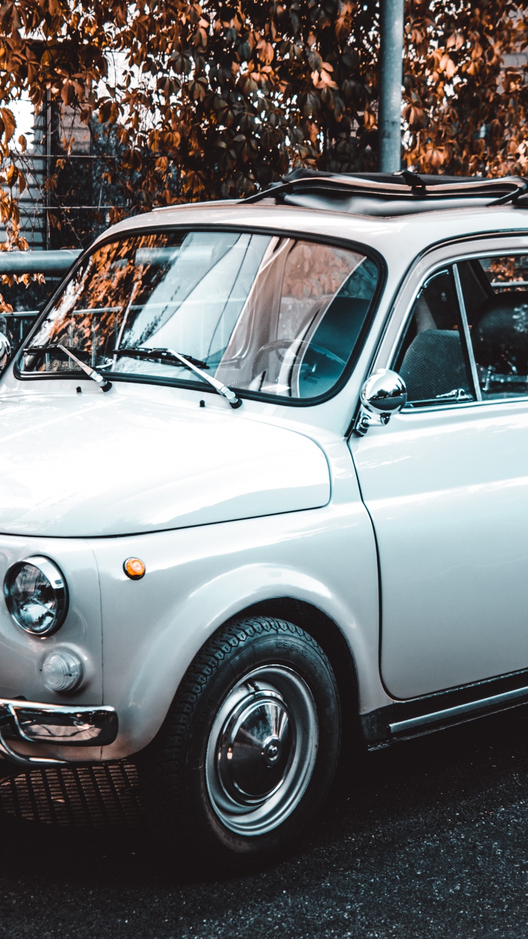 White Classic Car Parked on The Side of The Road. Wallpaper in 1080x1920 Resolution
