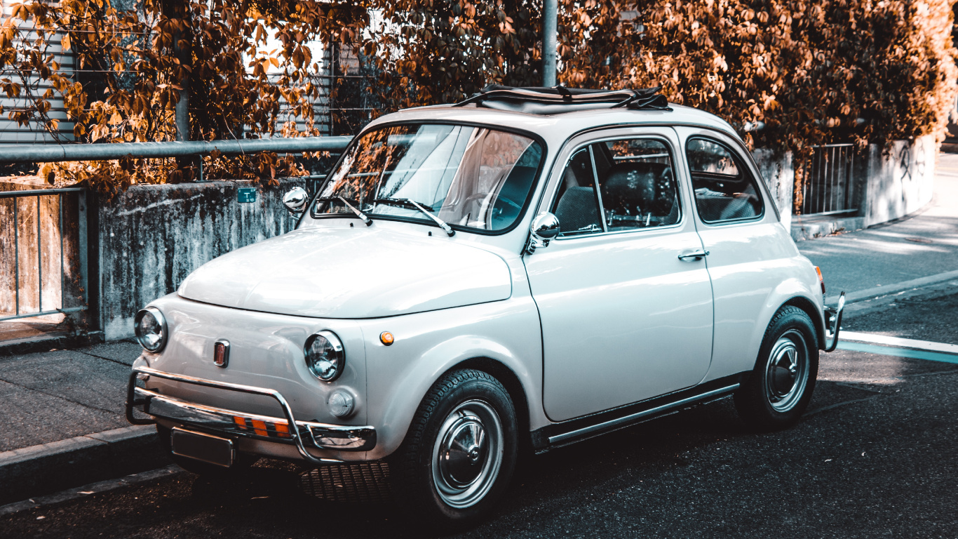 White Classic Car Parked on The Side of The Road. Wallpaper in 1366x768 Resolution