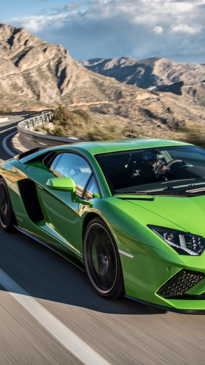 Green Porsche 911 on Road During Daytime. Wallpaper in 720x1280 Resolution