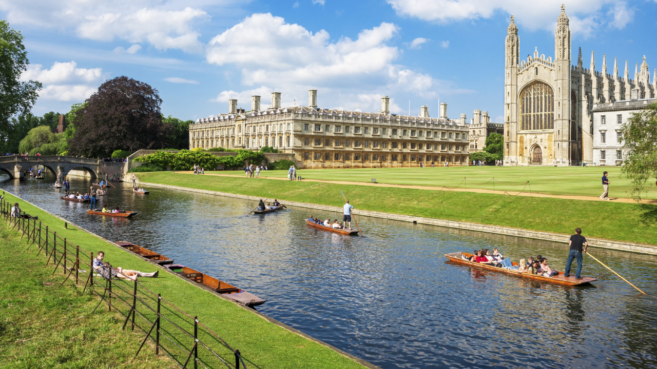 People Riding on Boat on River Near Building During Daytime. Wallpaper in 1280x720 Resolution