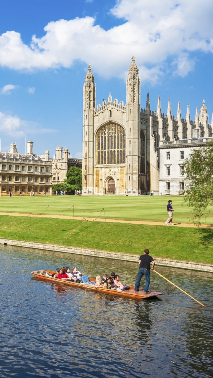 People Riding on Boat on River Near Building During Daytime. Wallpaper in 720x1280 Resolution