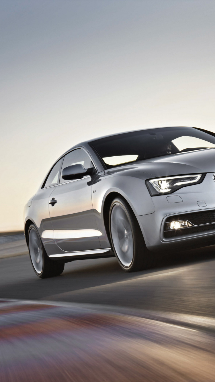 Weißes Mercedes Benz Coupé Unterwegs. Wallpaper in 750x1334 Resolution