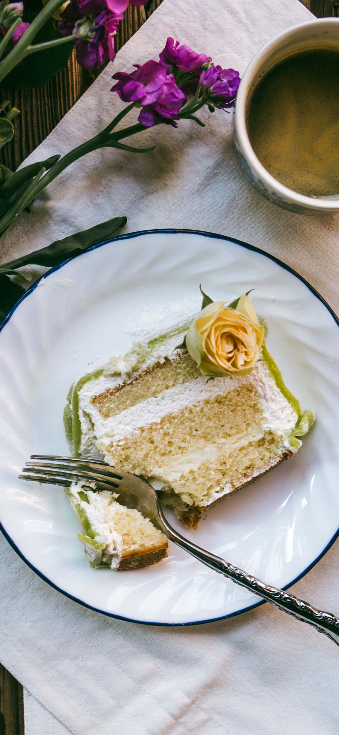 Sliced Cake on White Ceramic Plate Beside Silver Fork. Wallpaper in 1125x2436 Resolution