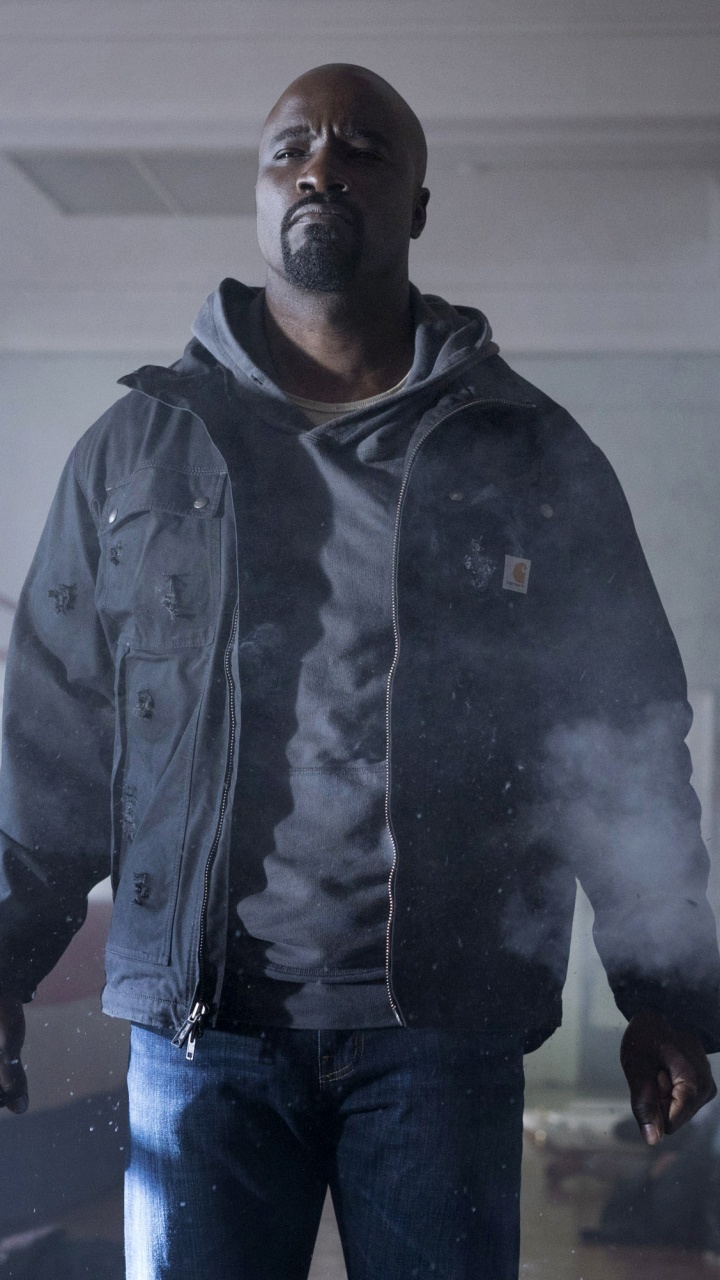 Man in Black Jacket and Blue Denim Jeans Standing. Wallpaper in 720x1280 Resolution