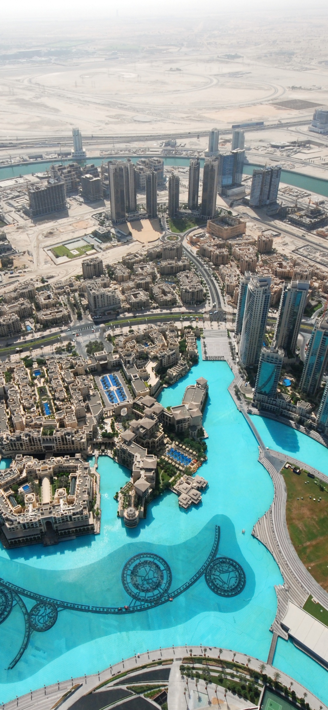 Aerial View of Swimming Pool During Daytime. Wallpaper in 1125x2436 Resolution