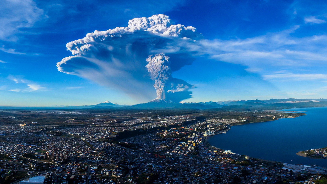 Aerial View of City Under Blue Sky and White Clouds During Daytime. Wallpaper in 1366x768 Resolution