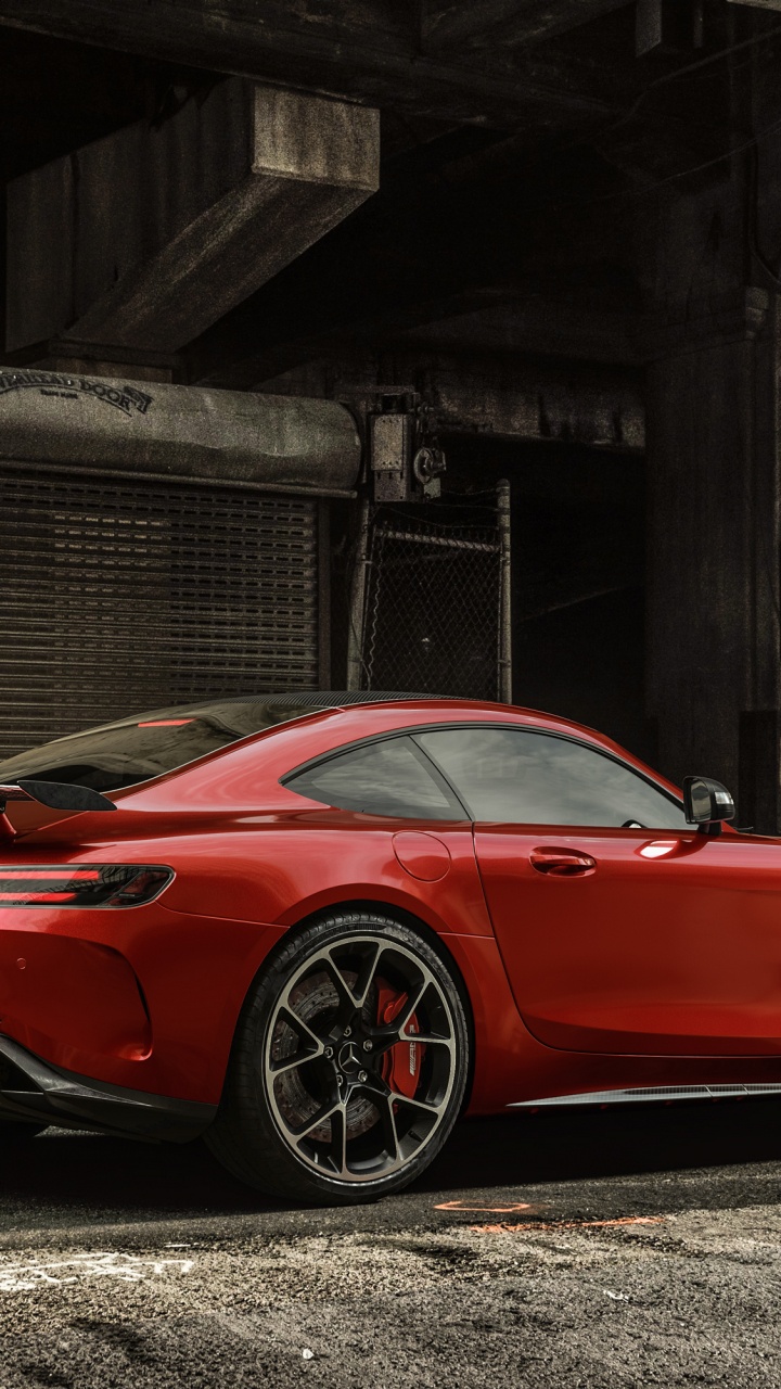 Red Ferrari 458 Italia Parked Beside Brown Wooden Building. Wallpaper in 720x1280 Resolution