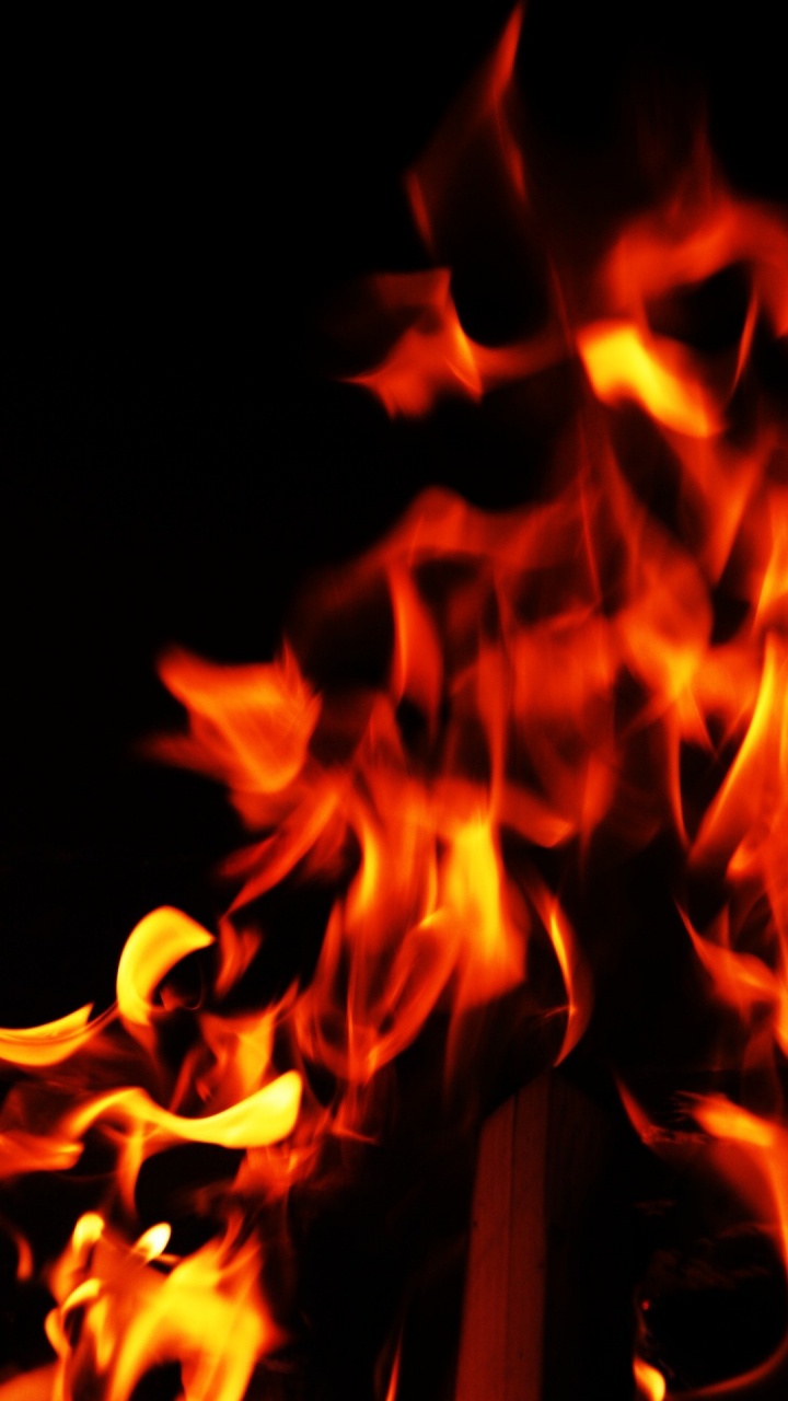 Fire in The Dark During Night Time. Wallpaper in 720x1280 Resolution