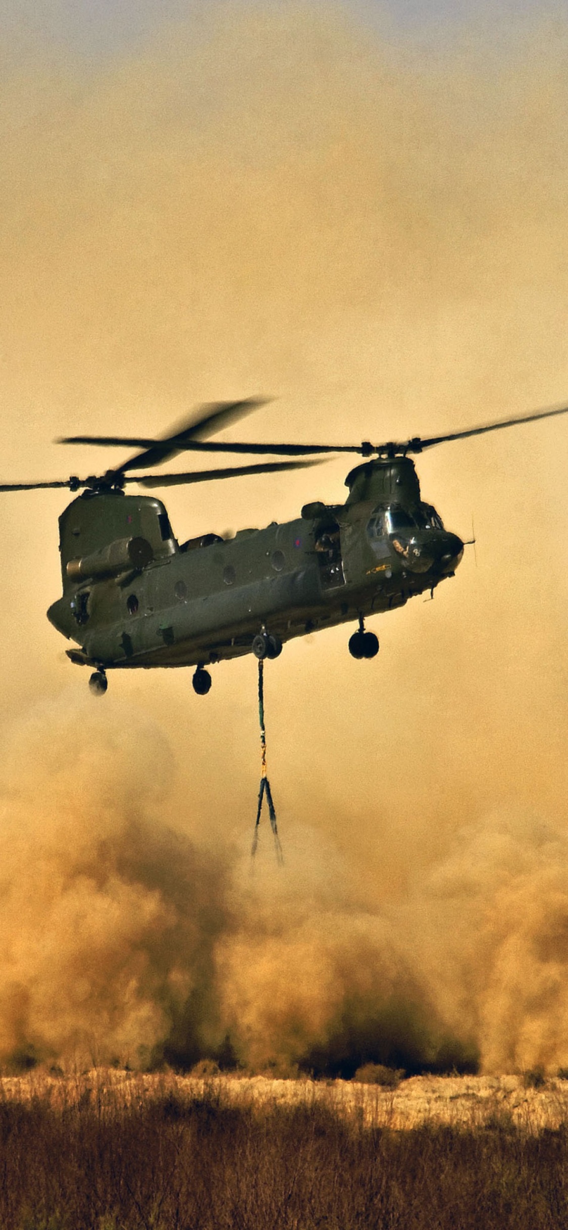 Helicóptero Negro Volando en el Cielo. Wallpaper in 1125x2436 Resolution