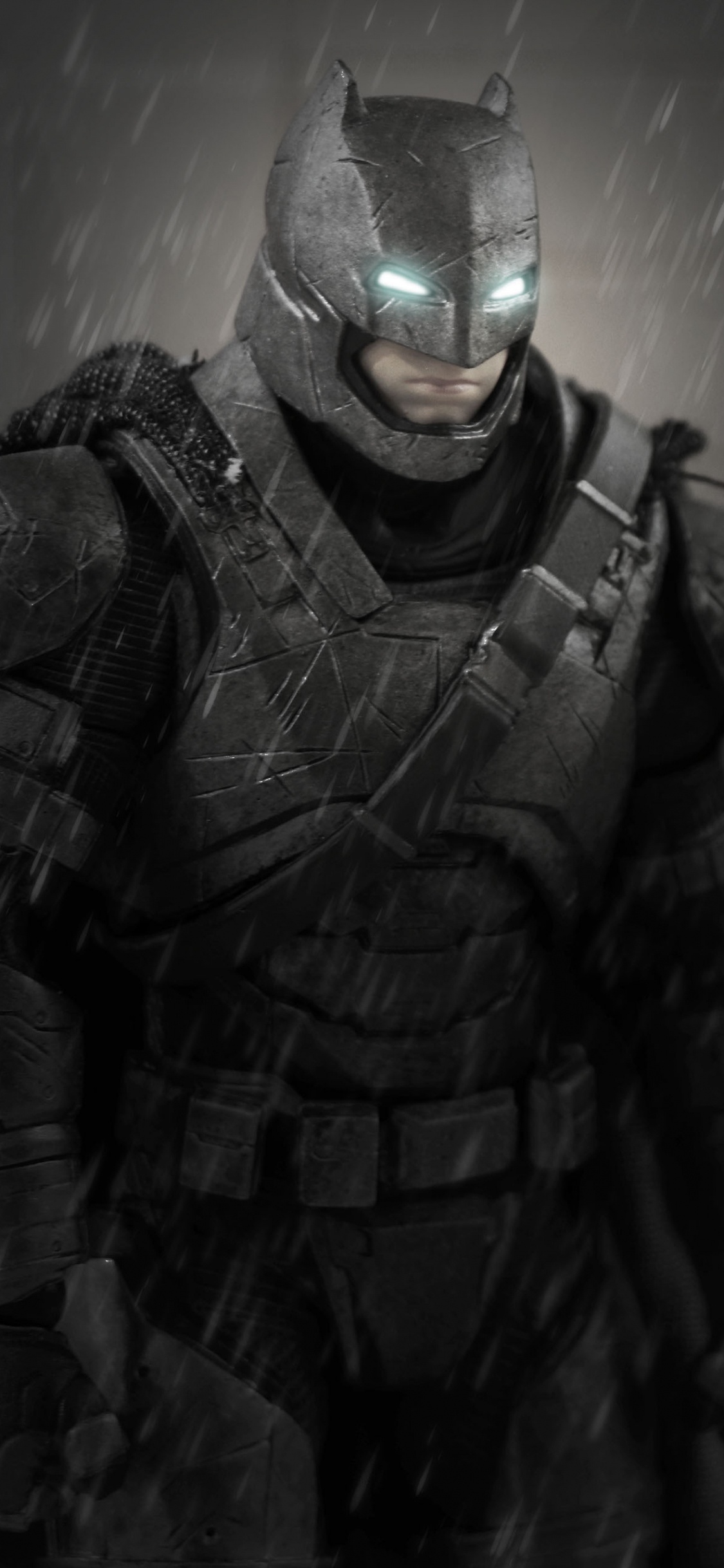 Man in Black and Gray Camouflage Suit. Wallpaper in 1125x2436 Resolution