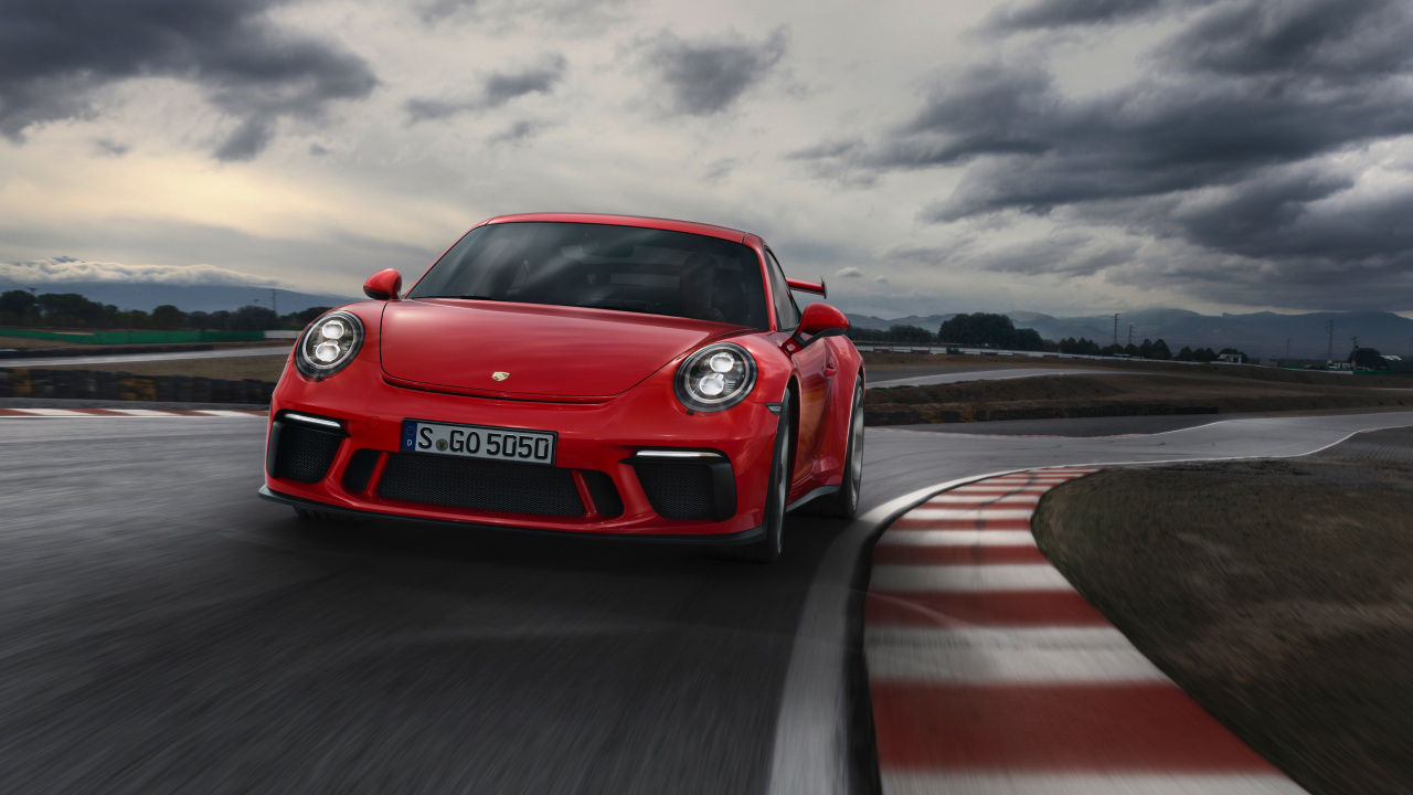 Porsche 911 Rouge Sur Route Sous Ciel Nuageux. Wallpaper in 1280x720 Resolution