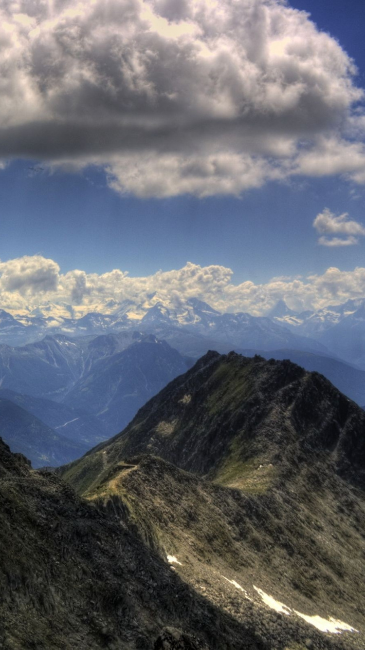 Green Mountain Under White Clouds and Blue Sky During Daytime. Wallpaper in 750x1334 Resolution
