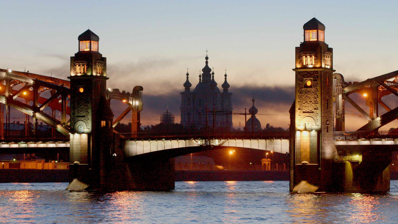 Brown Concrete Bridge Over River During Sunset. Wallpaper in 1280x720 Resolution