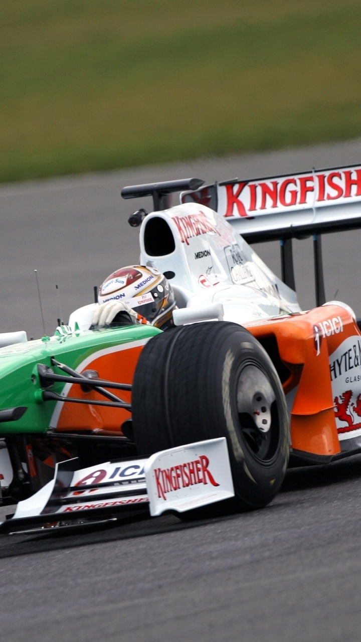Red and White Racing Car on Road During Daytime. Wallpaper in 720x1280 Resolution