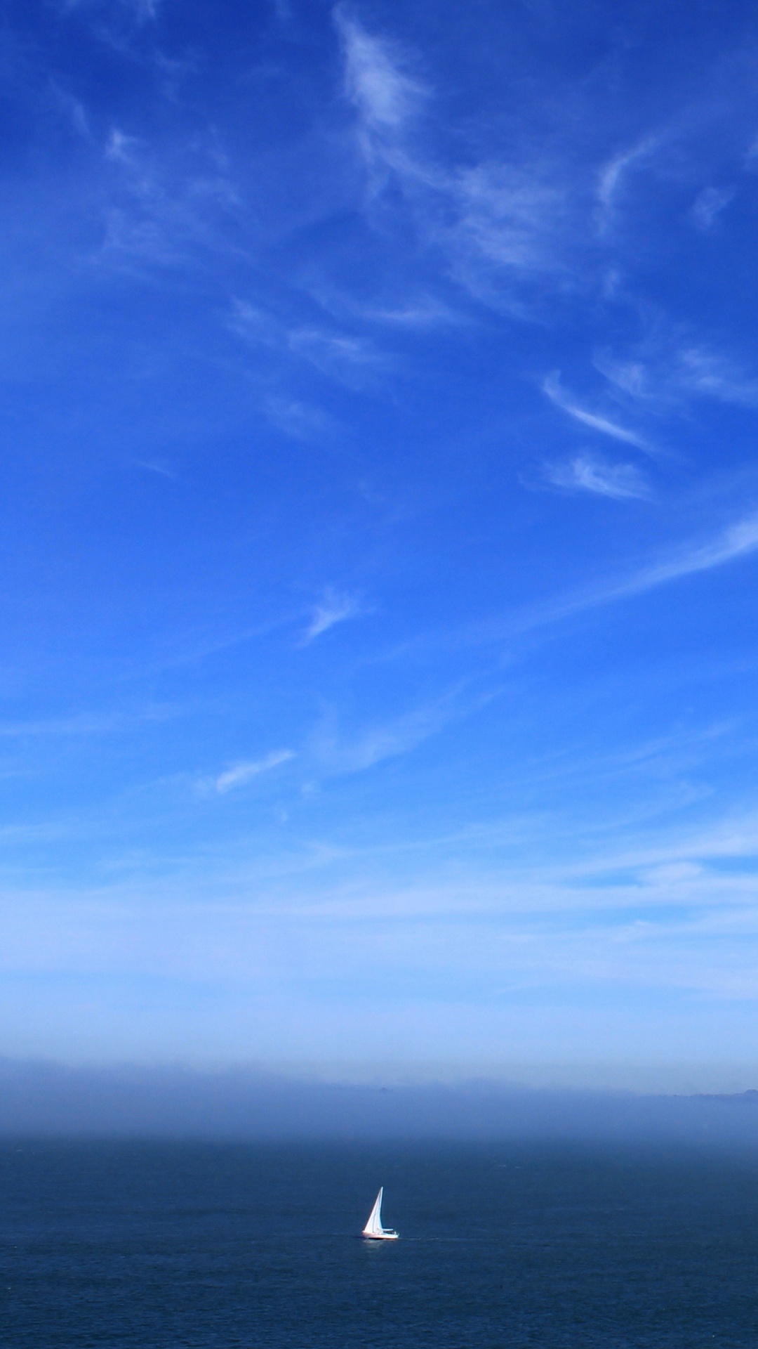 Person in Black Shirt Standing on Seashore During Daytime. Wallpaper in 1080x1920 Resolution