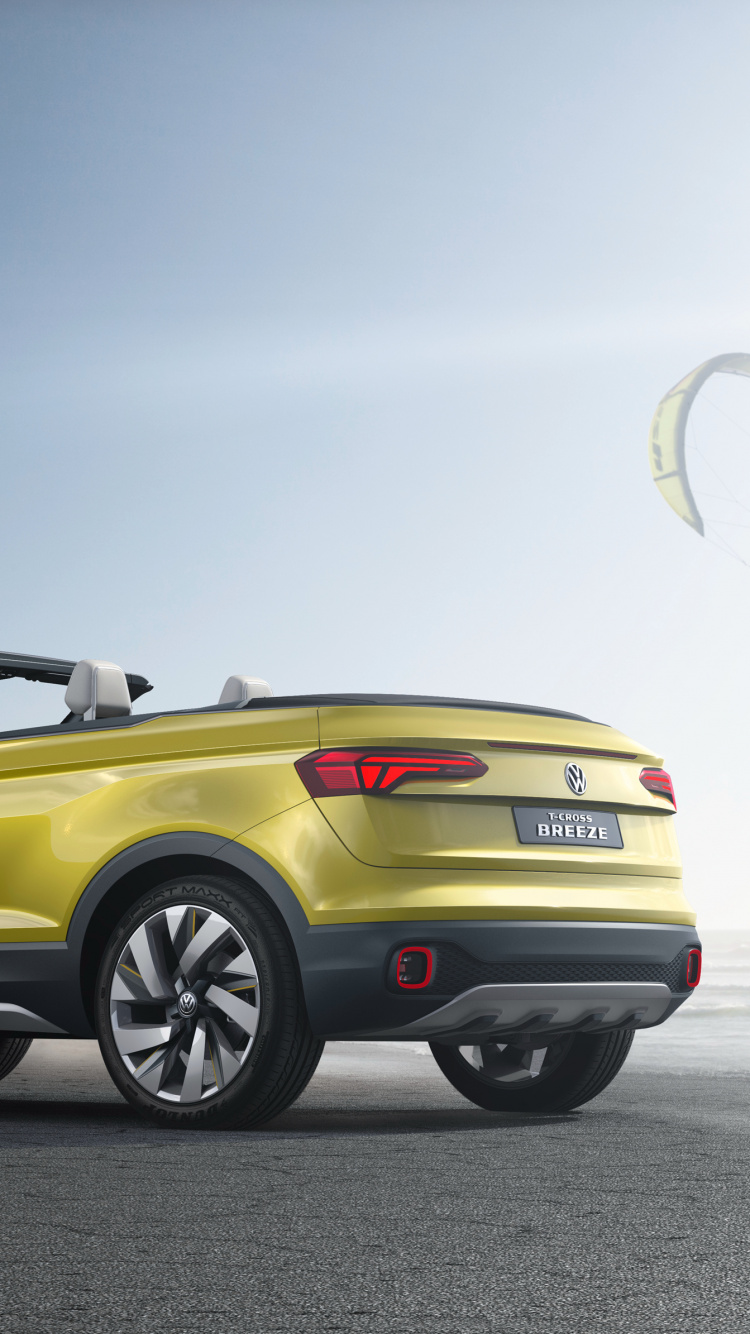 Yellow Convertible Coupe on Gray Asphalt Road During Daytime. Wallpaper in 750x1334 Resolution